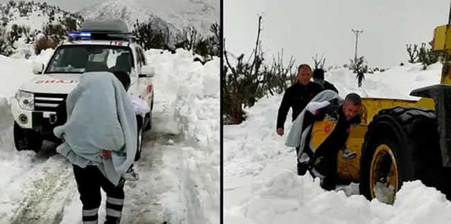 Kolu yanan çocuğu, karla kapalı yolda sırtta taşıdılar