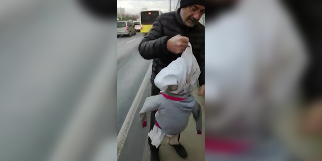 'Kardeşler aç abi' pankartıyla dilenen kadının kucağından bez bebek çıktı