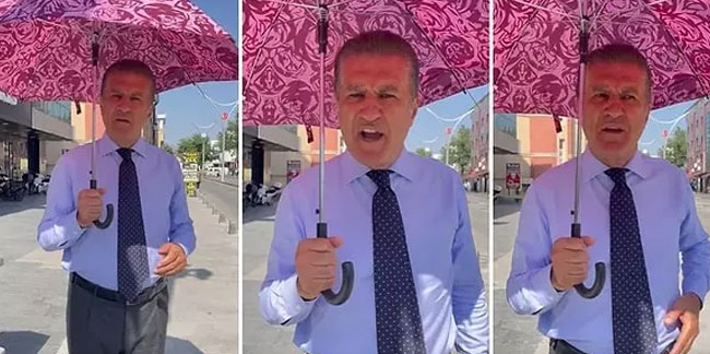 Mustafa Sarıgül şemsiye açtı: "Zam yağmurlarından korunmak için"