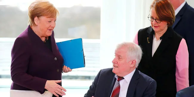 Almanya'da üst düzey 'koronavirüs' önlemi: Bakan, Merkel'in elini sıkmadı
