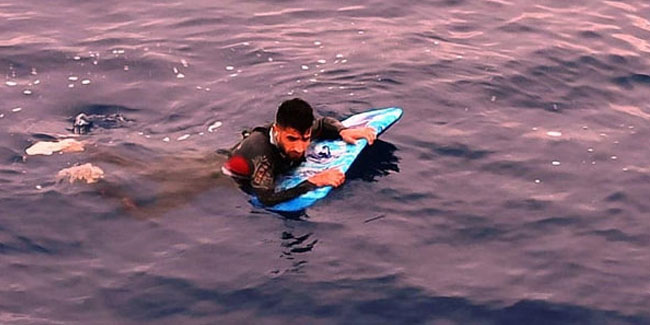 Yunanistan'a sörf tahtasıyla geçmek isterken yakalandı