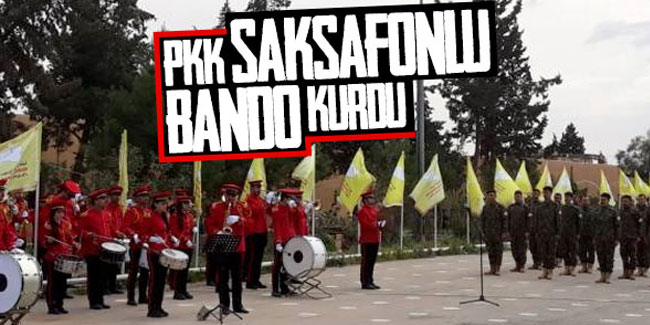 YPG'nin saksafonlu bando takımı