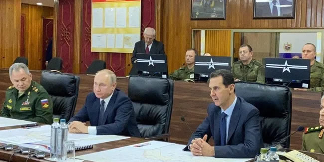 Putin Şam'daki Rus üssünde Esad ile bir araya geldi