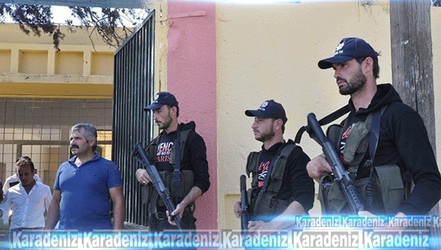 ÖSO üyelerine Türk polisi şapkası